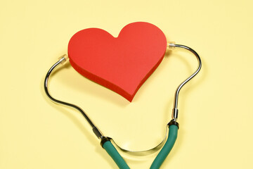 heart with a stethoscope symbolizing treatment of the human organ
