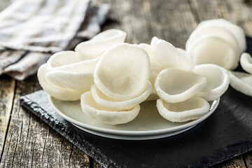 Puffed white snack chips. White potato chips.