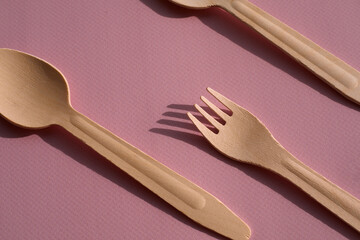 Organic serving pieces on pink background