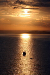 Fototapeta na wymiar Boat at Dawn