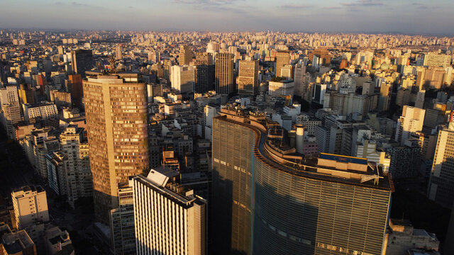 Aerial view of downtown Sao Paulo skyscrapers, in Brazil, during sunset.
