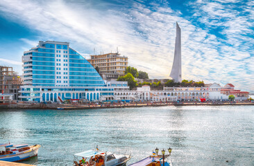 Residential complex Cape Khrustalny and the obelisk to the Hero City of Sevastopol during sunny day.