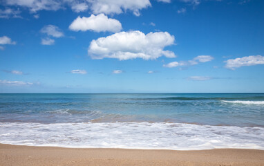Fototapeta na wymiar Summery seascape beach scene, Pouawa Beach, Gisborne, New Zealand 
