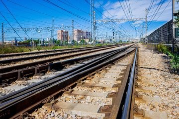 Valencia, Spain - April 16, 2021: Electrified multi-lane railroad near the Spanish city of Valencia.
