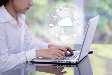 Woman using laptop with Smart services icons, concept of internet of things, new technology big data and business process strategy, customer service, cloud computing, learning online.