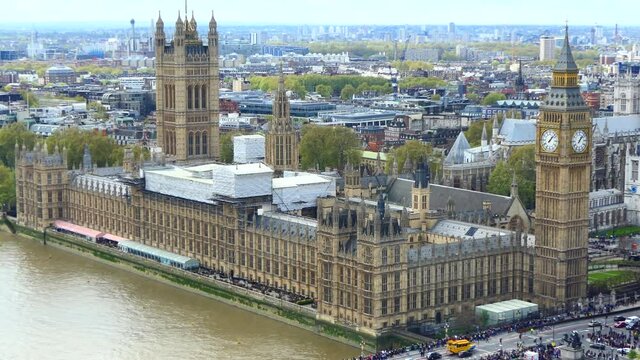 High angle view of the Palace of Westminster - houses of the Parliament of the United Kingdom on river Thames in London.