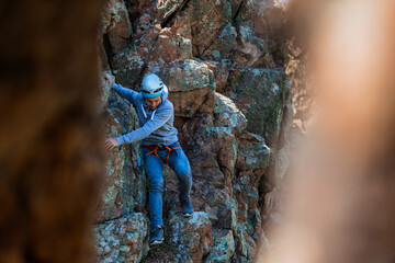 Concept of competition with climber that climbing a mountain