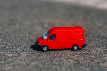 Red cargo van. Delivery car. Delivery service. Delivery service toy car concept