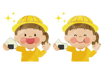 おにぎりを食べる小学生の子供4