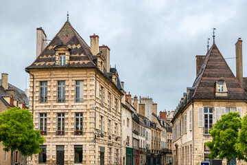 Fototapeta na wymiar Dijon, beautiful city in Burgundy, old buildings in the center with tiles roofs 