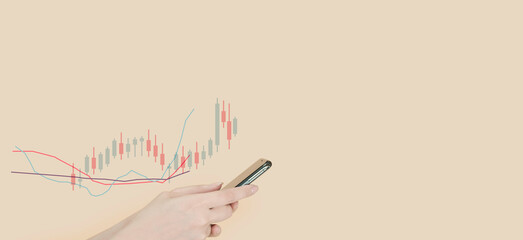 Woman hand with mobile and graph, Technical price graph and indicator, red and green candlestick...