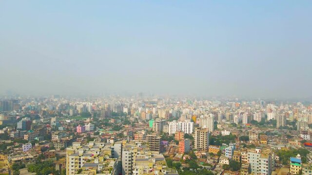 Aerial view over capital city of Bangladesh, Dhaka showing concrete jungle and high rise buildings.