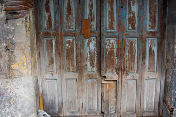 old wooden door with nails