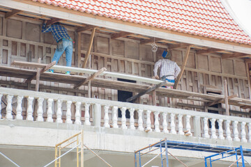 construction workers on the roof