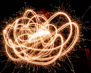 Abstract light trail art in night setting, long exposure 