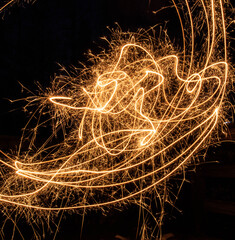 Abstract light trail art in night setting, long exposure 