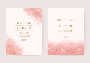 Wedding invitation cards with gold splatter and pink watercolor texture.