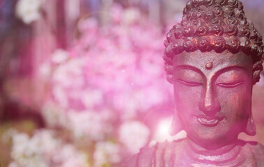 Buddha Statue in Outdoor Garden With Blurred Background