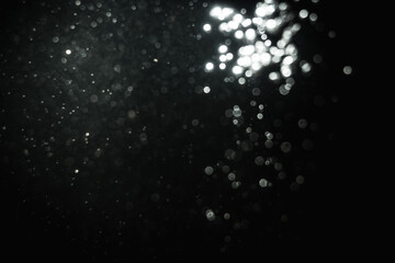 Obraz na płótnie Canvas Glittering stars of blur white bokeh