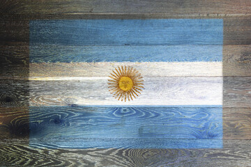 Argentina flag on rustic old wood surface background