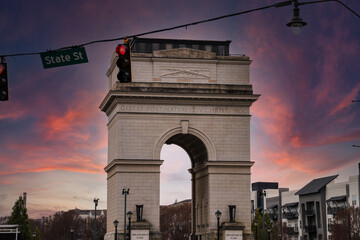 a stunning shot of the Triumphal arch downtown at the Millennium Gate Museum surrounded by...
