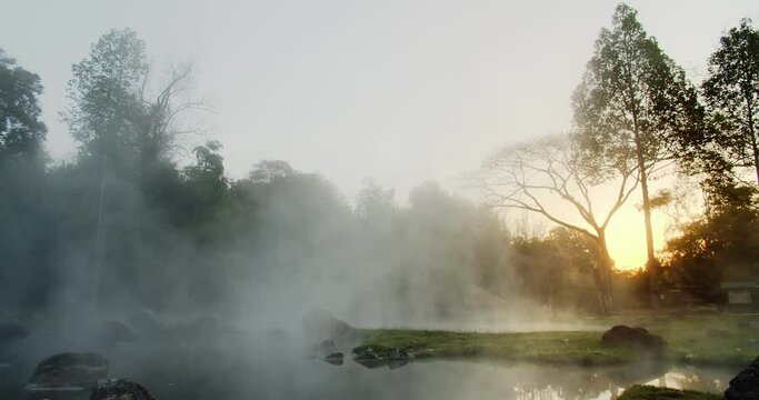 Beauty in nature Hot spring water Onsen Natural Bath with fog in the morning sunrise at Chae Son National Park, Lampang Thailand