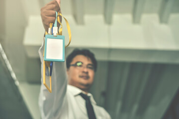 Blurry of Bunch of Blank staff tag badge.Employment and Employee badge concept