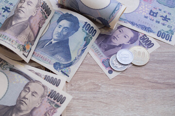 Japanese yen notes and Japanese yen coins for money concept background.