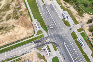 suburb crossroad under construction. road construction site. aerial view
