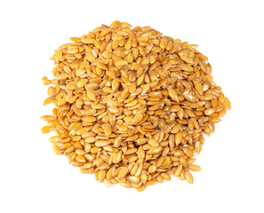 handful of golden flax seeds closeup on white