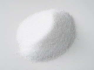 pile of crystalline extract of stevia on white