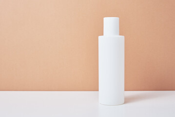 White cosmetics mockup on beige background