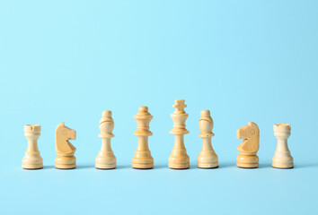 Chess pieces on color background