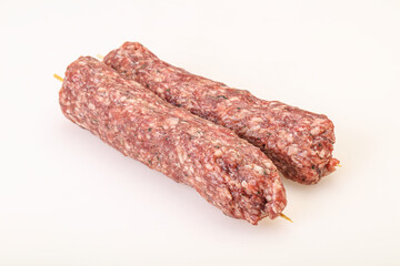 Raw minced beef kebab skewer