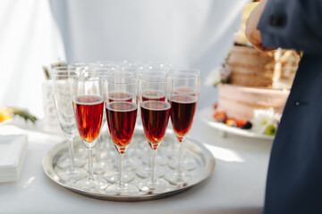 Drinks on a tray at an event