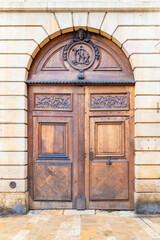 Dijon, beautiful city in Burgundy, old wooden door in the center 
