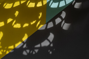 Minimalist light and shade composition on yellow, gray and blue.