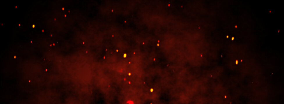 Fire embers particles over black background. 
Fire sparks background. 
Abstract dark glitter fire particles lights.