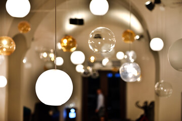 Hanging glass lamps in a room