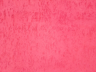 plastered pink wall texture.