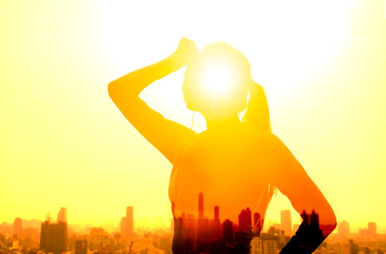 Double Exposure Portrait Of  Young Fitness Woman Hand Wiping Sweat And  Summer Heat Wave Concept