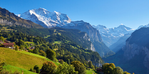 Panoramic view of the high mountain peaks near Wengen village in Switzerland.