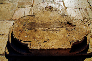 remains of a stone Christian cross in the square in front of the dome of the rock