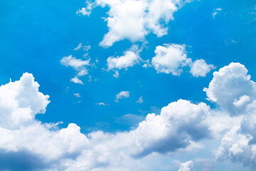 Summer clouds on bright blue sky  background with vast space