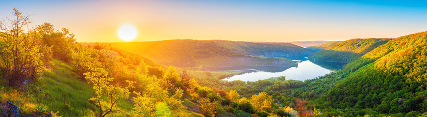 Vivid sunrise landscape in the national nature park Podilski Tovtry, canyon and Studenytsia river...