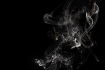 cloud of white smoke on black background