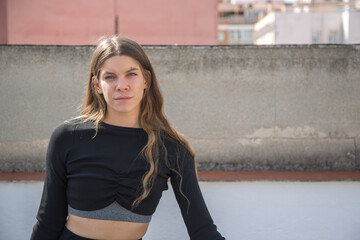 portrait of pretty young woman outdoors 