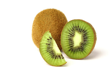 whole kiwi fruit and its sliced segments isolated on white background.