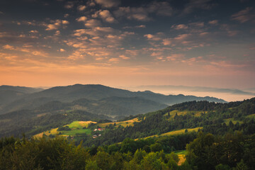 Fototapeta premium Summer morning seen from the observation tower in Koziarz in the Beskid Sądecki. Natural landscapes with great views.