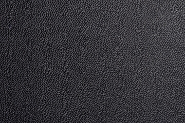 Fototapeta na wymiar Black fine texture of genuine rough leather. Natural expensive products